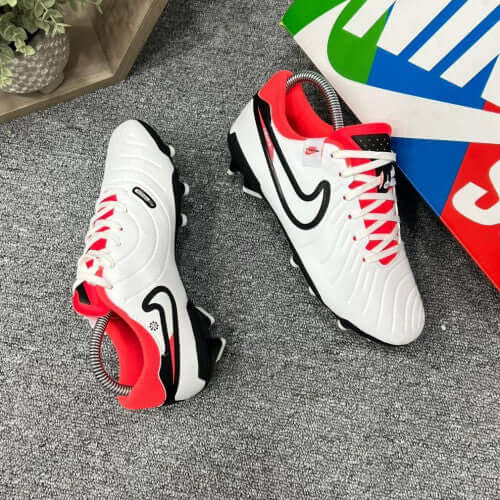 NIKE TIEMPO GUAYO DAMA soccer cleats in white and red with black accents, showcasing style and performance.