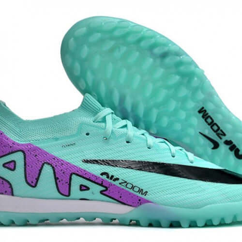 NIKE Air Zoom Verde Morado Sintetico shoes with teal and purple design, featuring a black swoosh and textured sole.